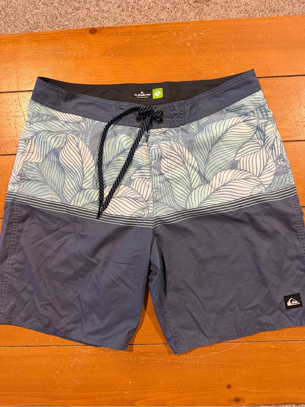 Quiksilver Men’s Navy Blue and Light Teal Leaf-Print Board Shorts